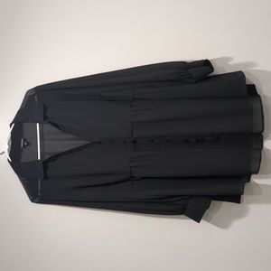 Torrid sheer back blouse.